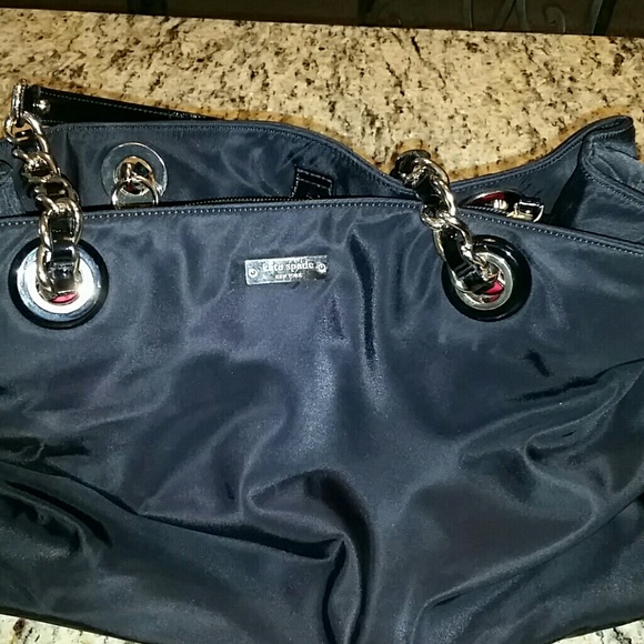 Kate Spade diaper bag w/changing pad, lots of pock